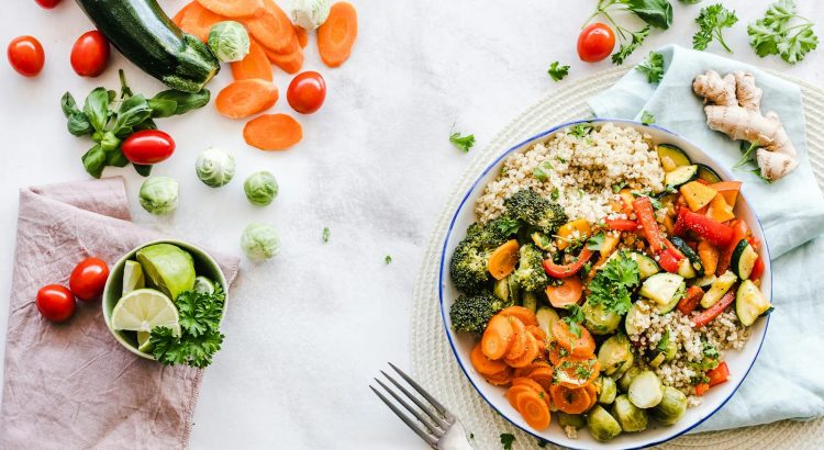 Colorful quinoa salad with fresh vegetables creates a healthy, balanced meal.