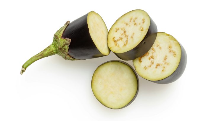 sliced green fruit on white surface